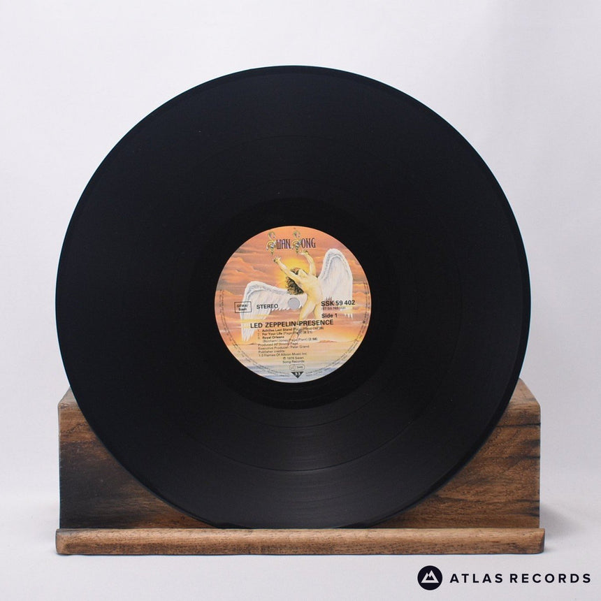 Led Zeppelin - Presence - Reissue Strawberry LP Vinyl Record - VG+/VG+