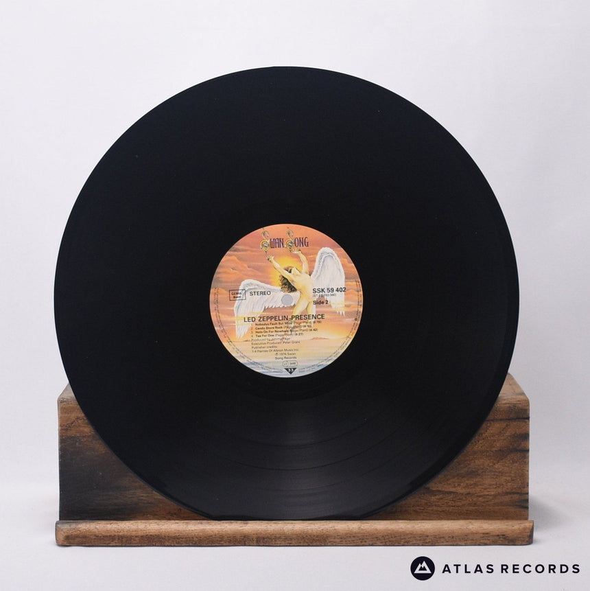 Led Zeppelin - Presence - Reissue Strawberry LP Vinyl Record - VG+/VG+
