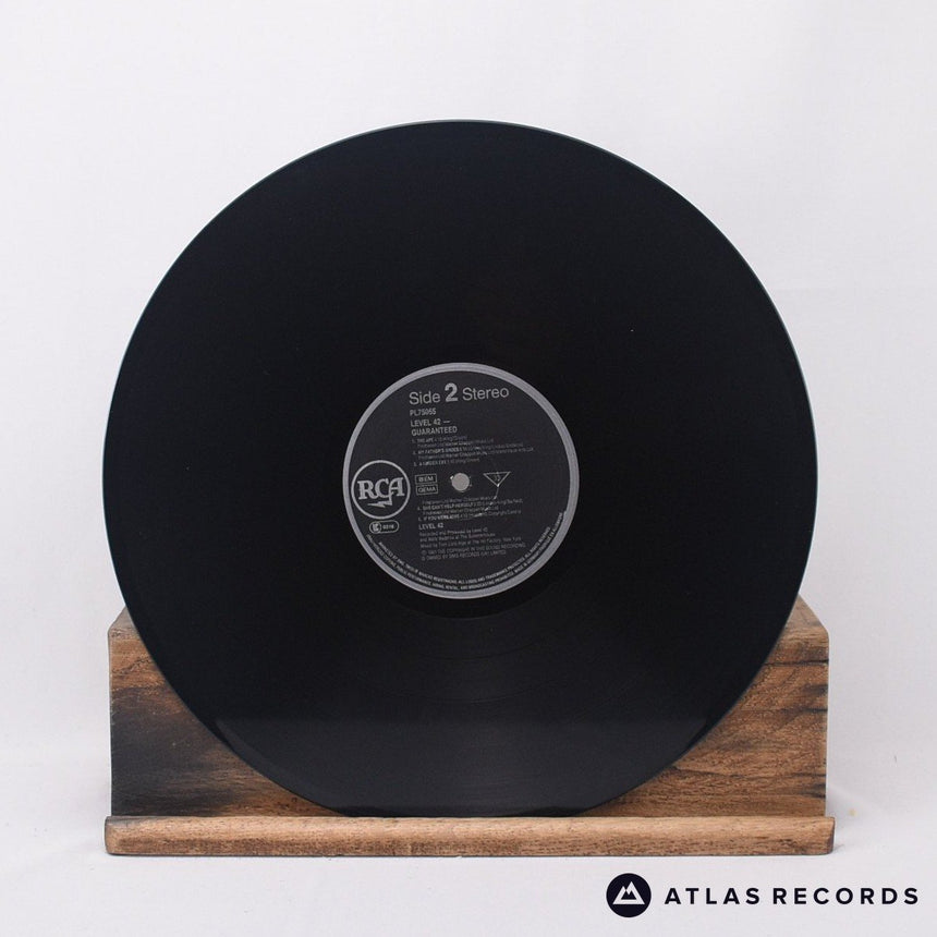 Level 42 - Guaranteed - Insert LP Vinyl Record - VG+/NM