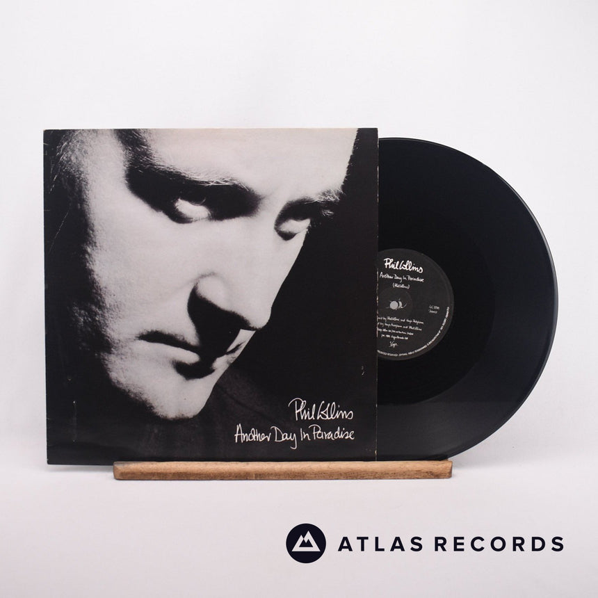 Phil Collins Another Day In Paradise 12" Vinyl Record - Front Cover & Record