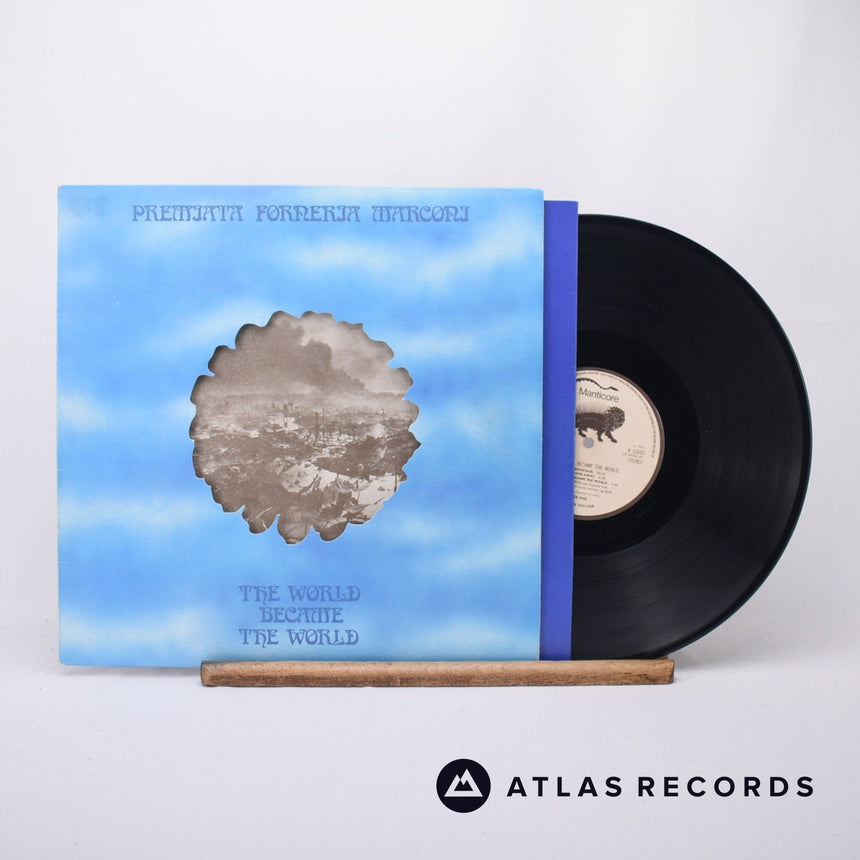 Premiata Forneria Marconi - The World Became The World - LP Vinyl Record - EX/EX