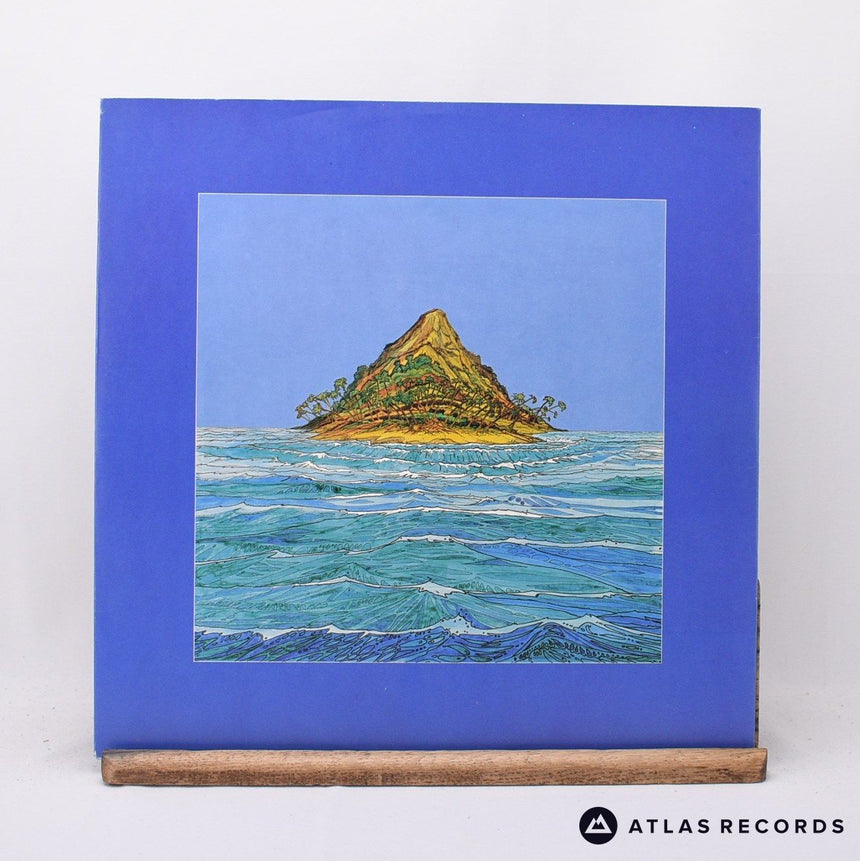 Premiata Forneria Marconi - The World Became The World - LP Vinyl Record - EX/EX