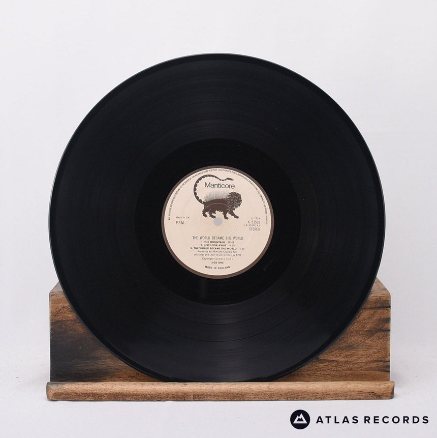 Premiata Forneria Marconi - The World Became The World - LP Vinyl Record - EX/EX