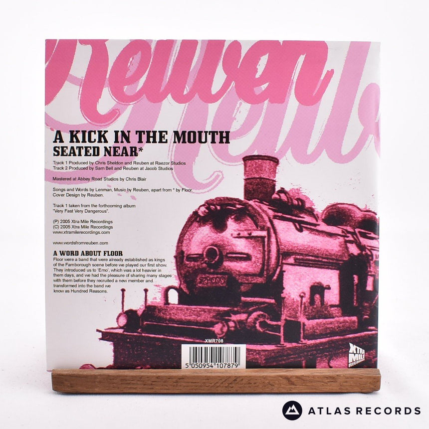 Reuben - A Kick In The Mouth - 7" Vinyl Record - NM/NM