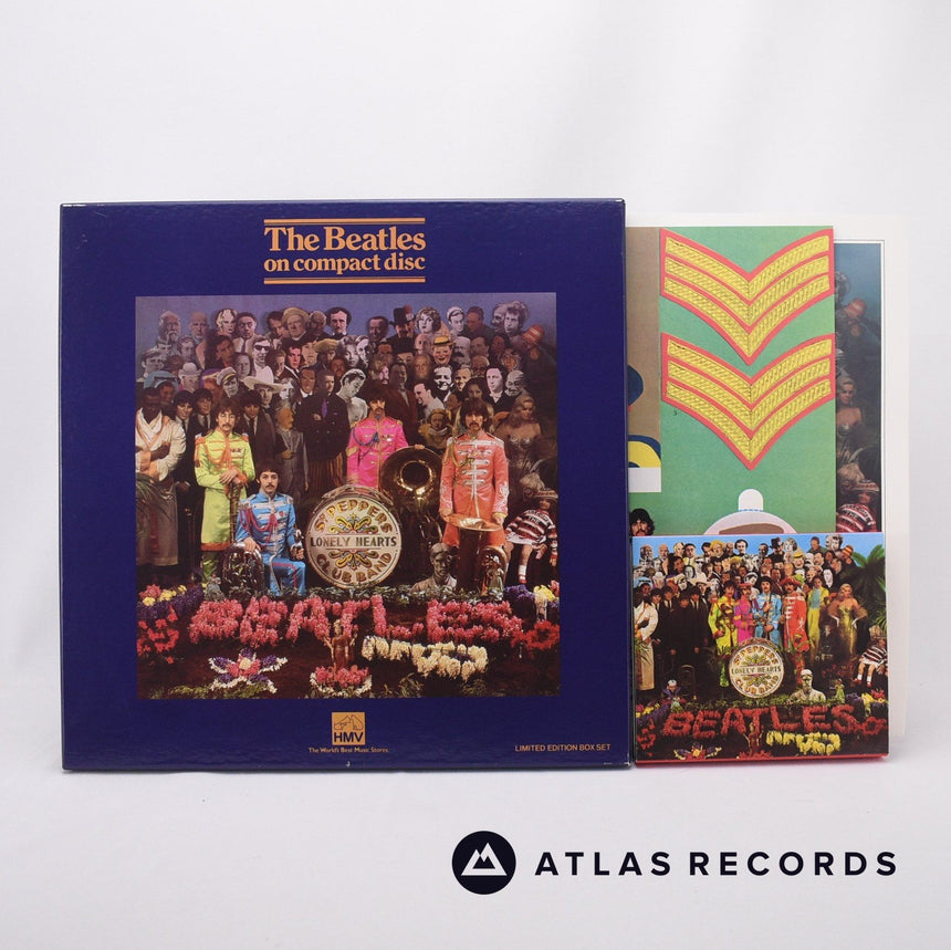 The Beatles Sgt. Pepper's Lonely Hearts Club Band CD Vinyl Record - Front Cover & Record