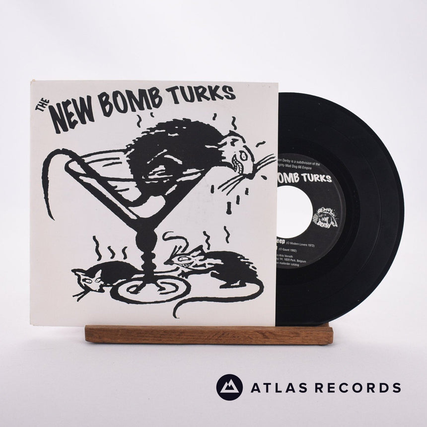 The New Bomb Turks I Wanna Sleep 7" Vinyl Record - Front Cover & Record