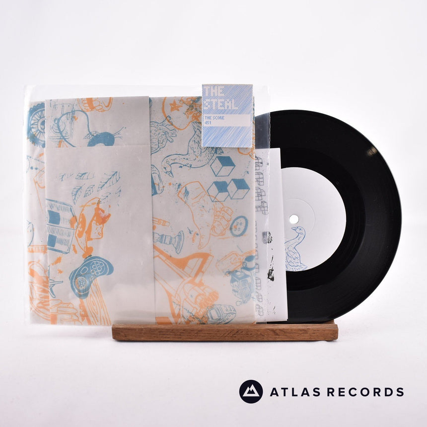 The Steal Split 7" Vinyl Record - Front Cover & Record