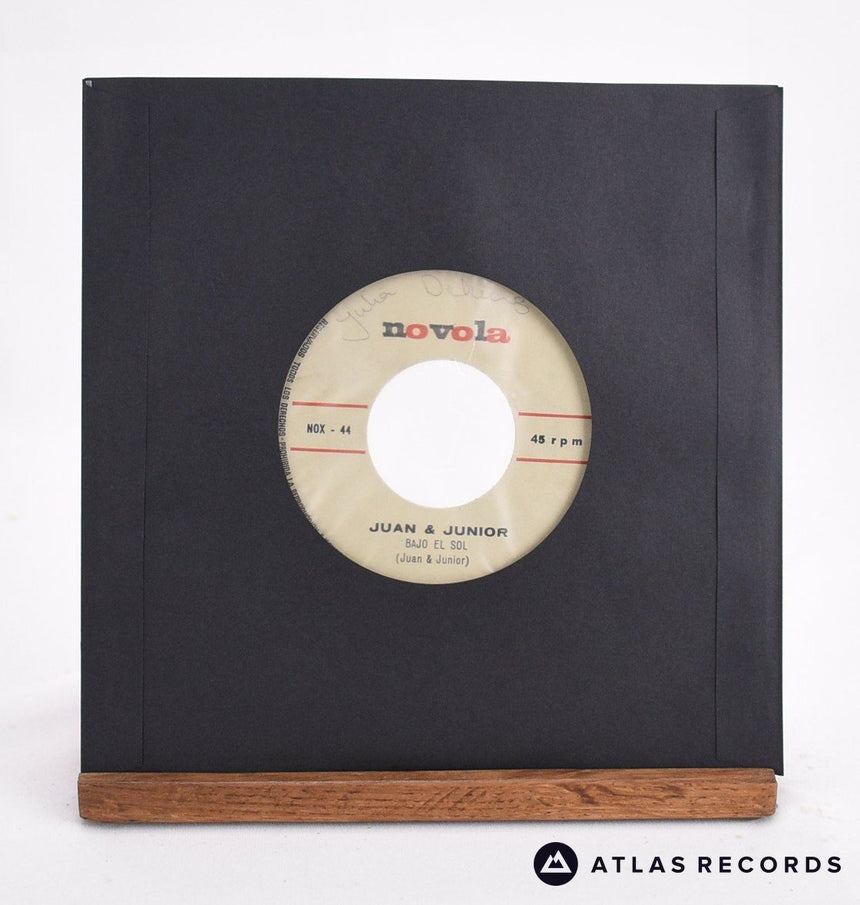 Juan & Junior - Nos Falta Fé / Bajo El Sol - 7" Vinyl Record - VG+