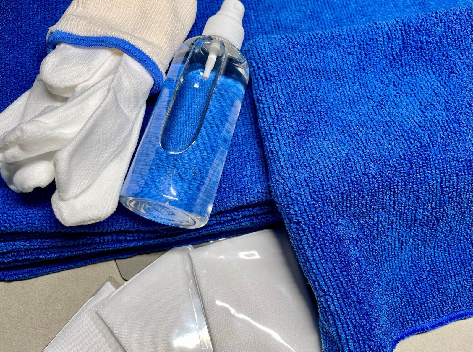 Vinyl cleaning fluid with lint free gloves and microfibre cloths