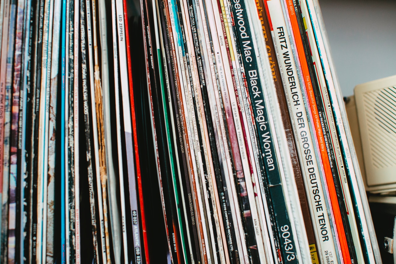 Second hand records being stored upright on a shelf