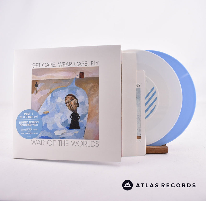 Get Cape. Wear Cape. Fly War Of The Worlds 7" Vinyl Record - Front Cover & Record