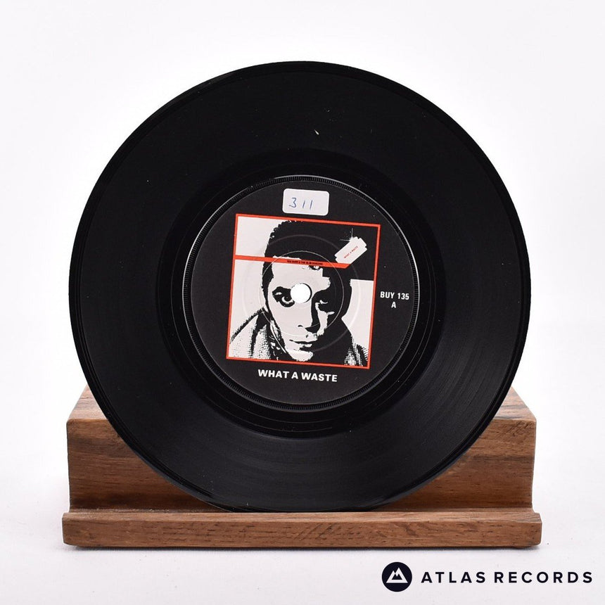 Ian Dury And The Blockheads - What A Waste - Reissue 7" Vinyl Record - VG+/VG+