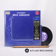 Passengers Miss Sarajevo 7" Vinyl Record - Front Cover & Record