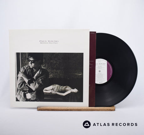 Paul Young Between Two Fires LP Vinyl Record - Front Cover & Record