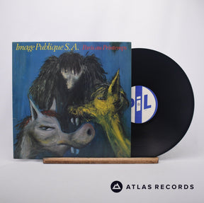 Public Image Limited Paris Au Printemps = Paris In The Spring LP Vinyl Record - Front Cover & Record