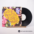 The Artist The Most Beautiful Girl In The World 12" Vinyl Record - Front Cover & Record