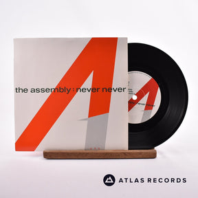 The Assembly Never Never 7" Vinyl Record - Front Cover & Record