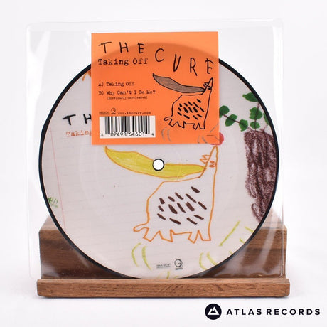 The Cure Taking Off 7" Vinyl Record - Front Cover & Record