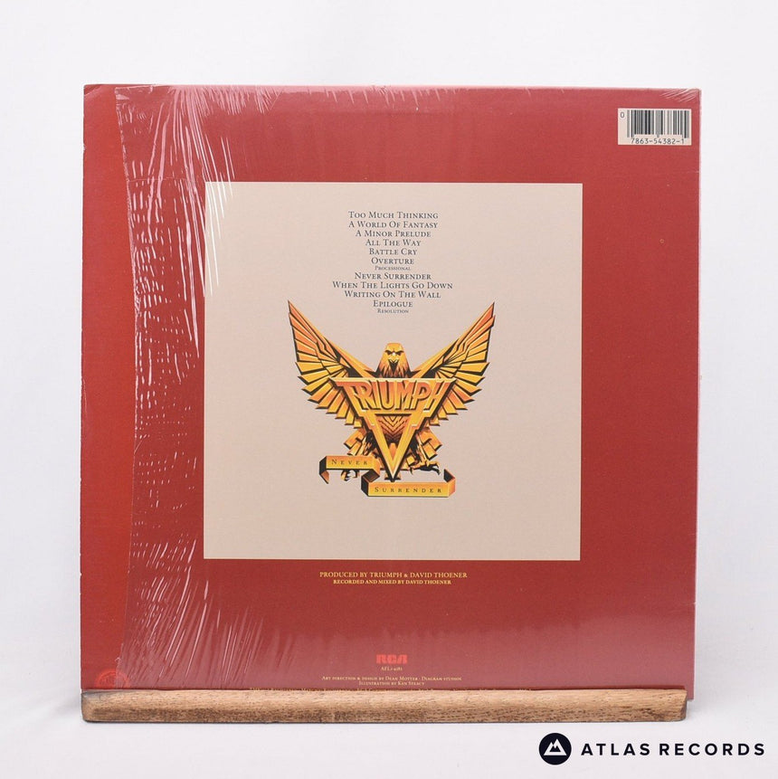 Triumph - Never Surrender - First Press Us LP Vinyl Record - EX/EX