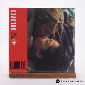 Unloved Strange Effect 7" Vinyl Record - Front Cover & Record